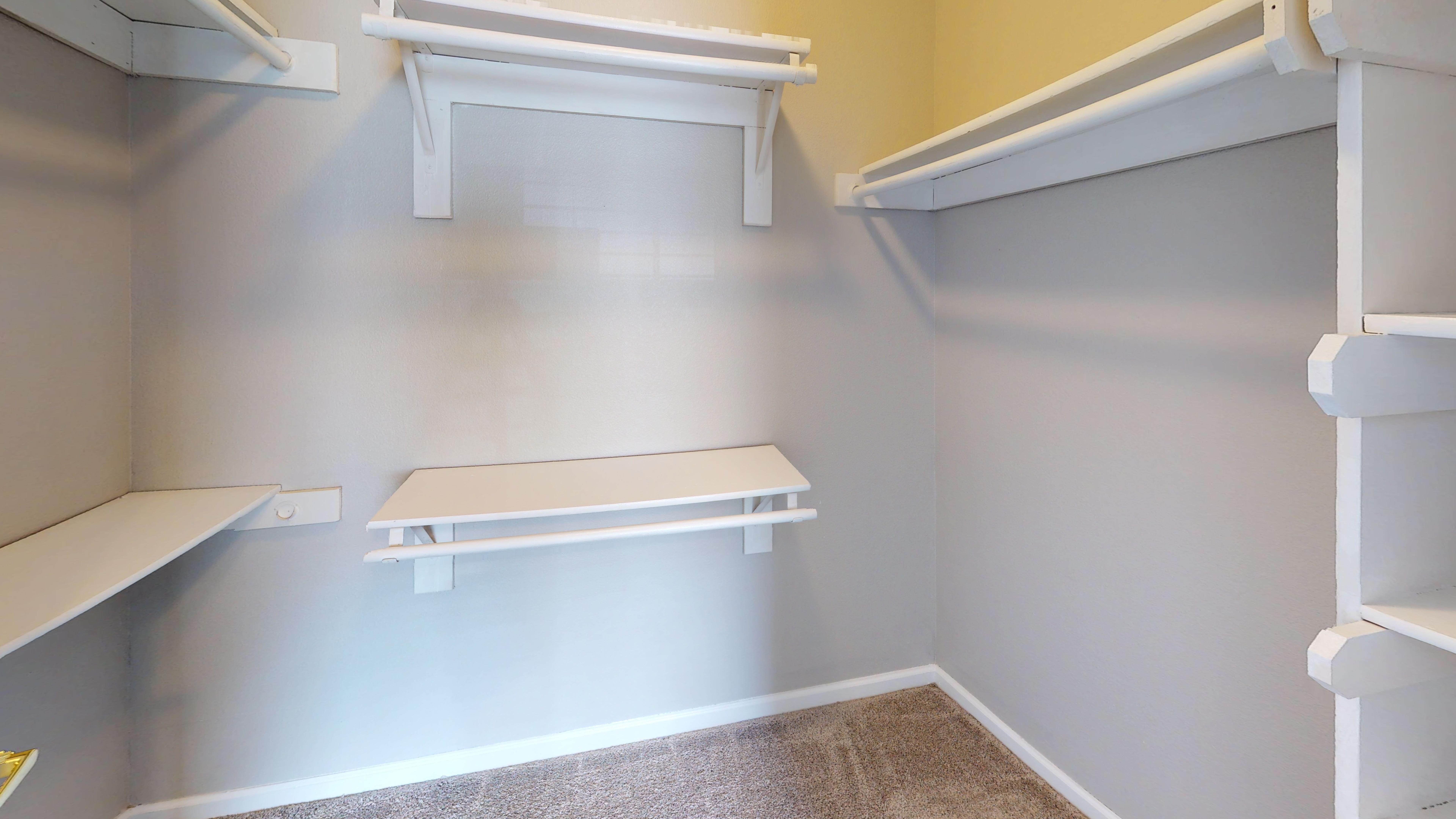 Walk-in closet with built-in shelving